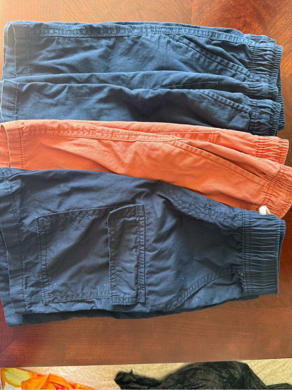 Set of boys shorts. Orange and Navy.